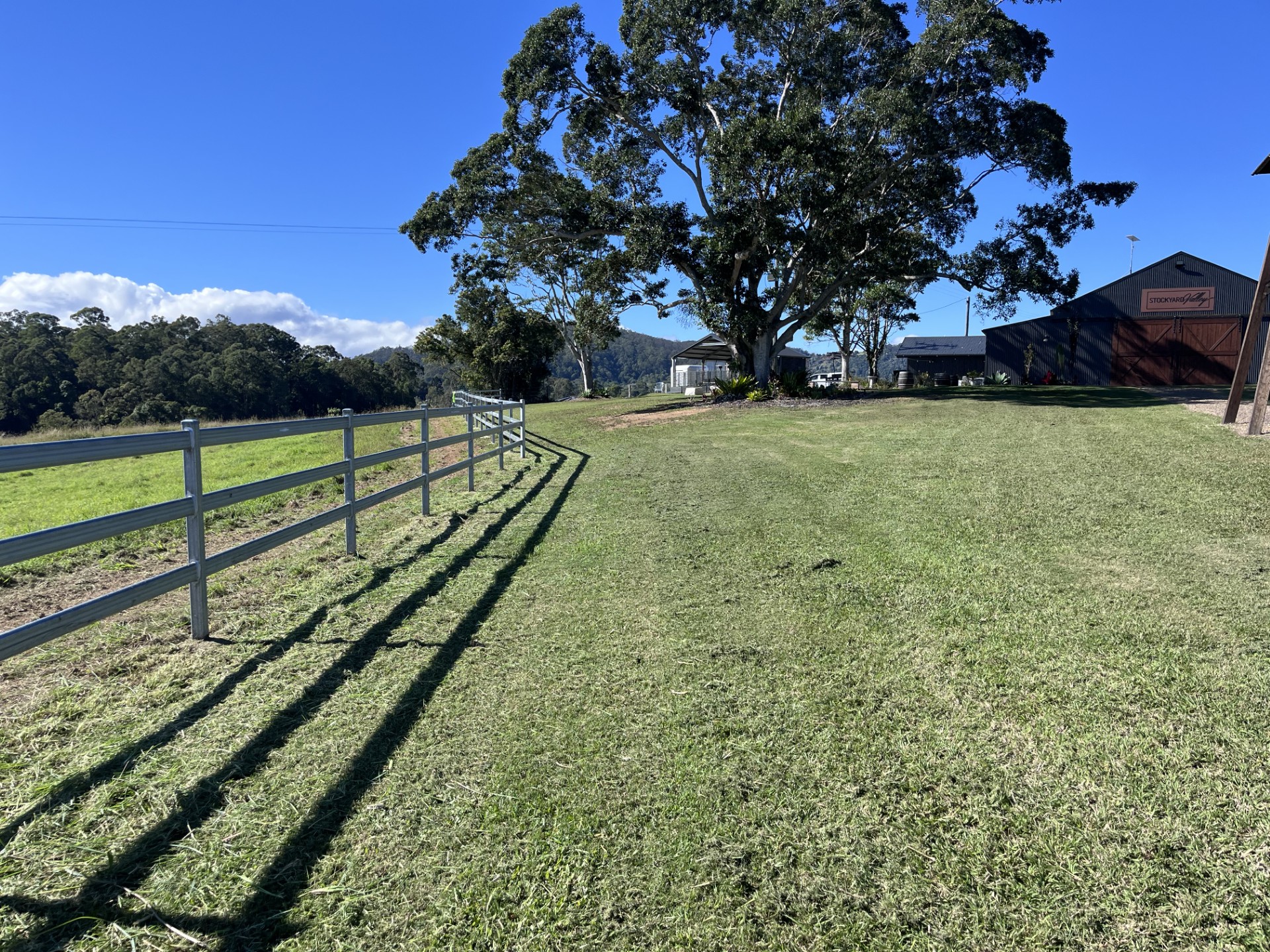 Commercial Premises Maintenance: Venue grounds mow and fence line trim — after