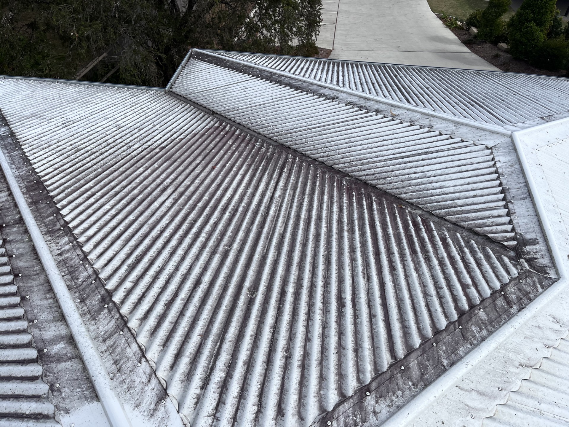 Pressure Washing: Roof pressure clean — before
