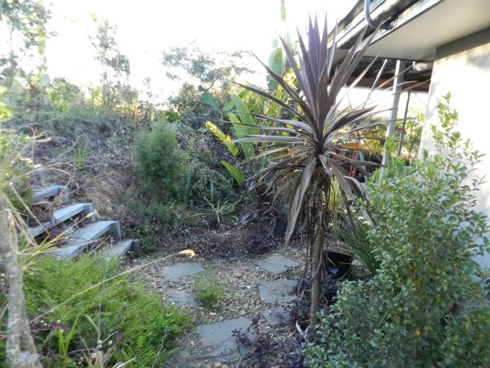 Soft Landscaping - including Turfing: Retaining wall, turf and garden beds — before